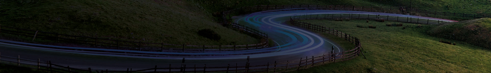 Electric car driving on UK country road