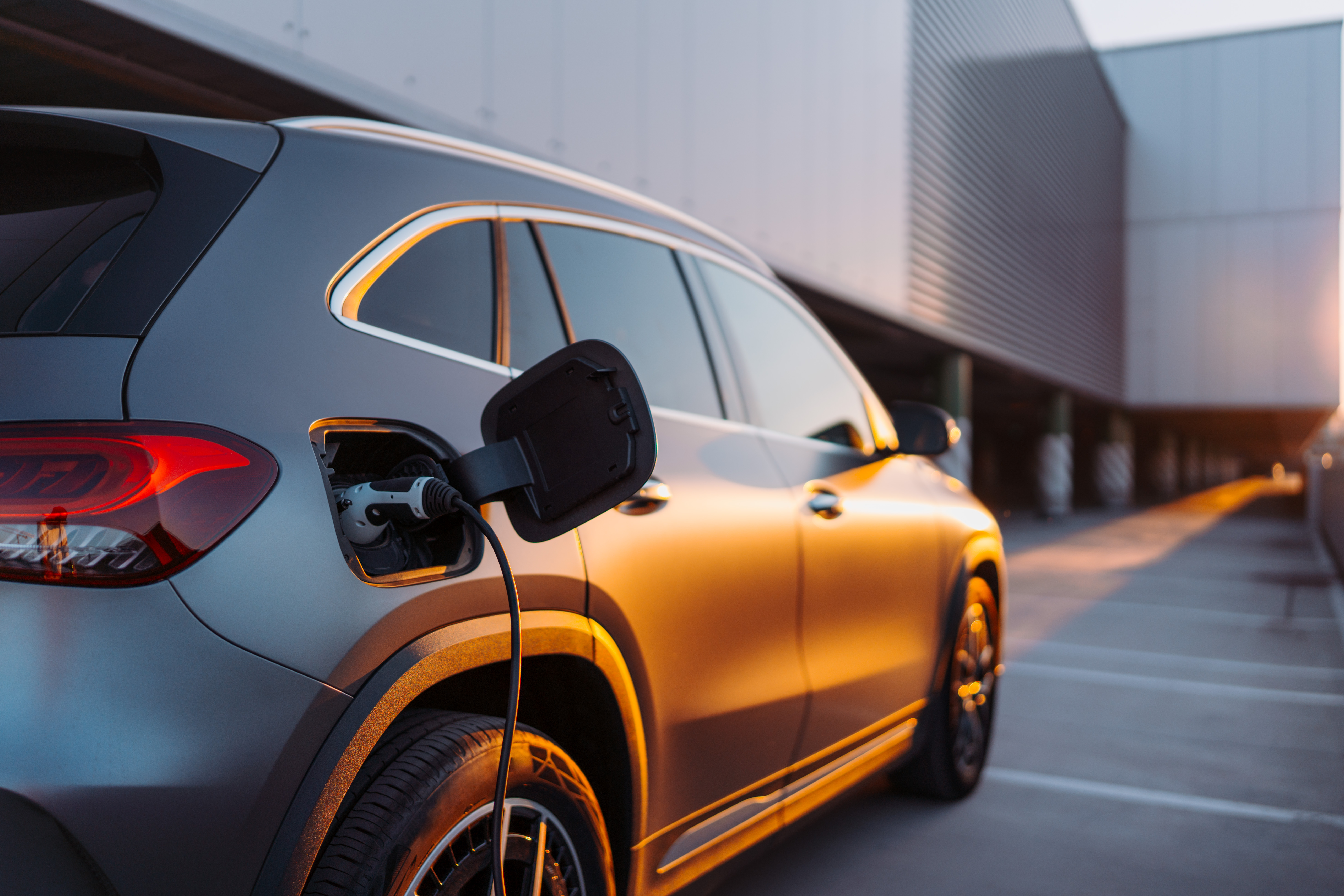 Electric vehicle charging at modern business location